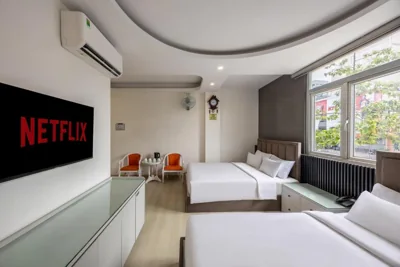 Deluxe Familiar — A25 Premium Hotel - 65G Nguyen Thai Hoc