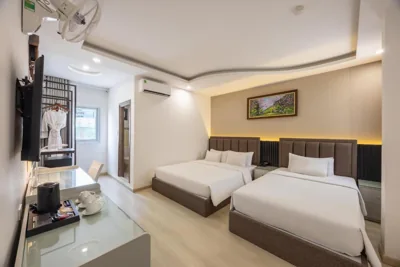 Habitación Familiar — A25 Premium Hotel - 65G Nguyen Thai Hoc